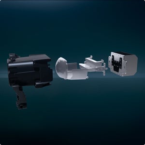 Diagram of a full-LED headlight with the parts separated against a darkened background.